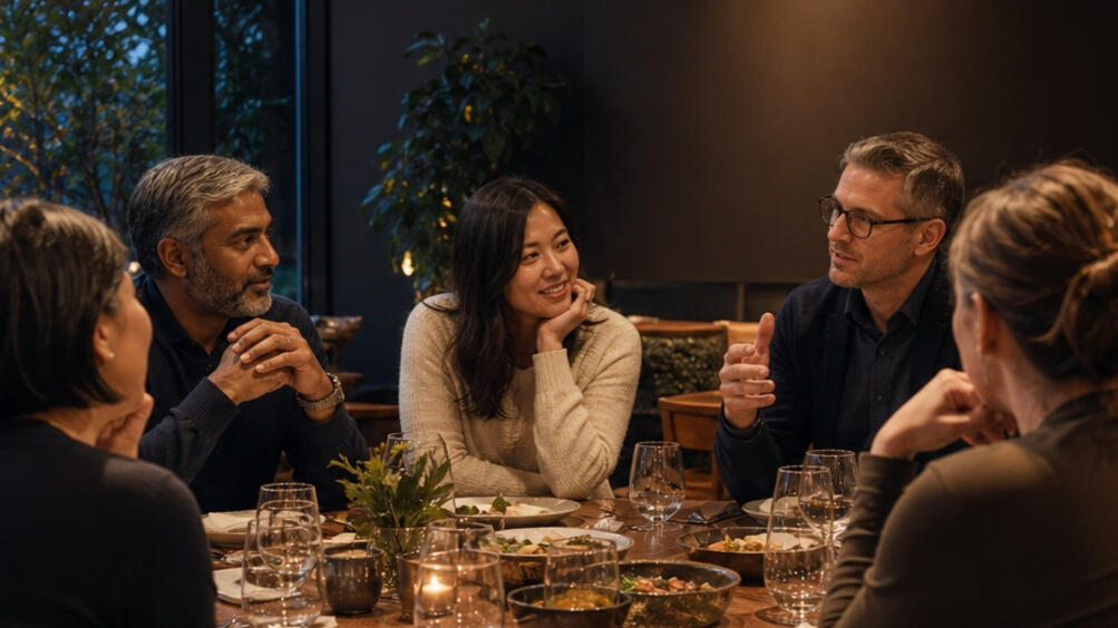 Experienced founders in conversation around a restaurant table
